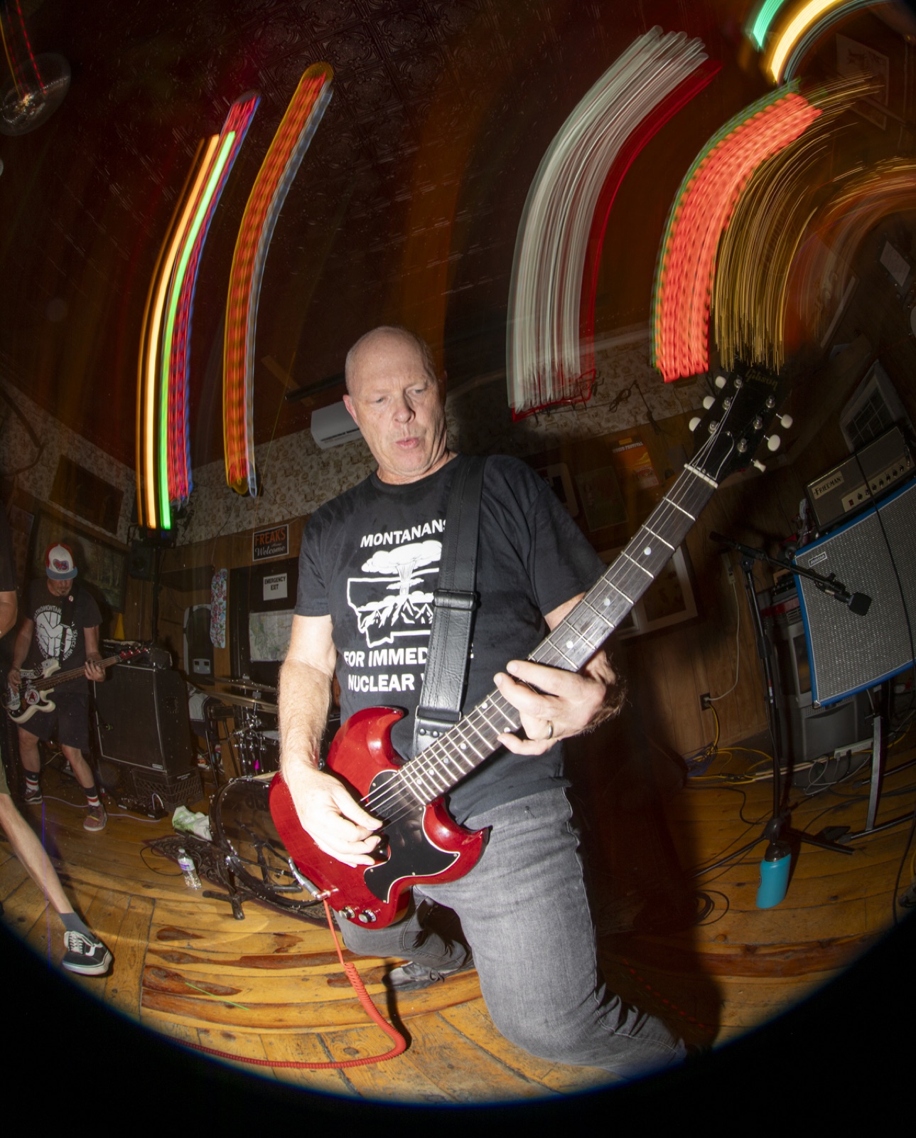 P.E.S.T. guitarist under streaking lights at Big Sandy